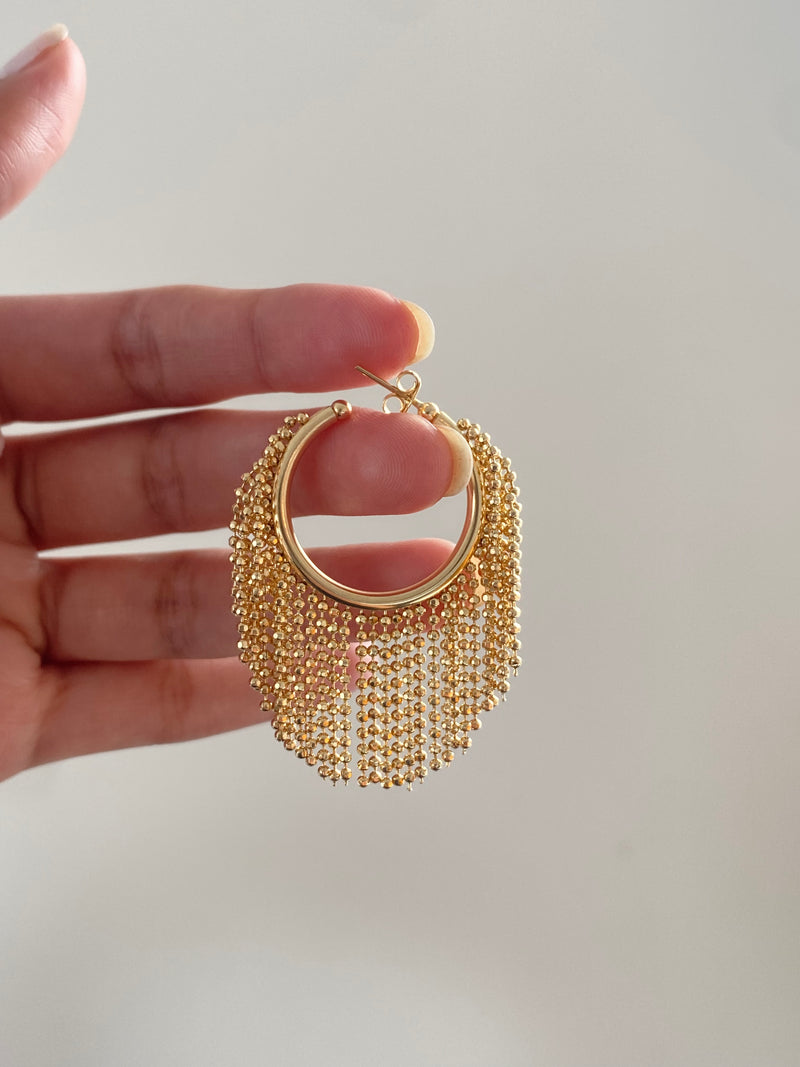 Gold ball fringe hoop earrings